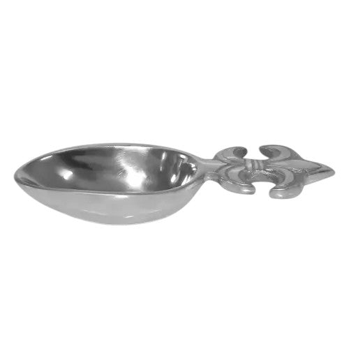 Metallic ladle with decorative handle on a white background