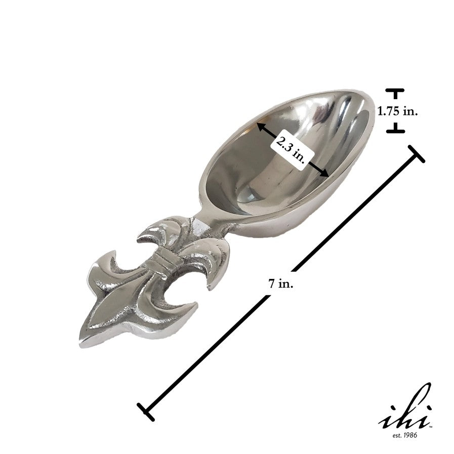 Silver decorative spoon with measurements on a white background