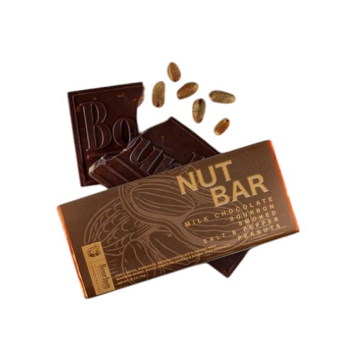Chocolate nut bar with packaging on a white background