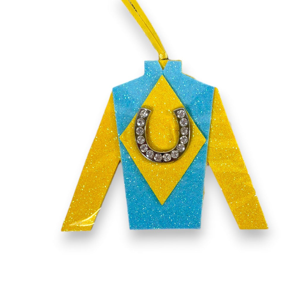 A vibrant blue jockey silk ornament with a bold yellow diamond pattern in the center.
