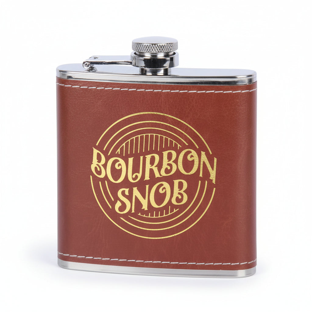 Front view of the "Bourbon Snob" flask featuring bold gold script.
