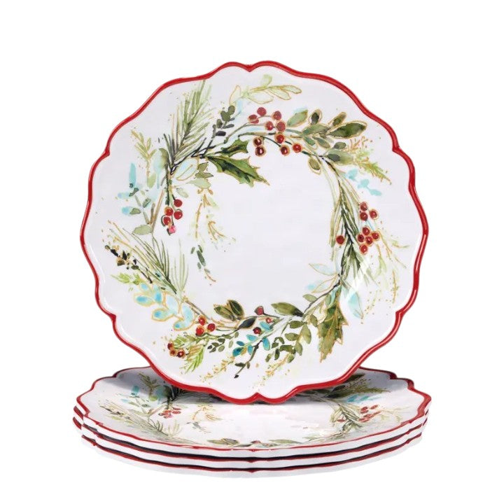 Set of decorative plates with floral wreath design on a white background