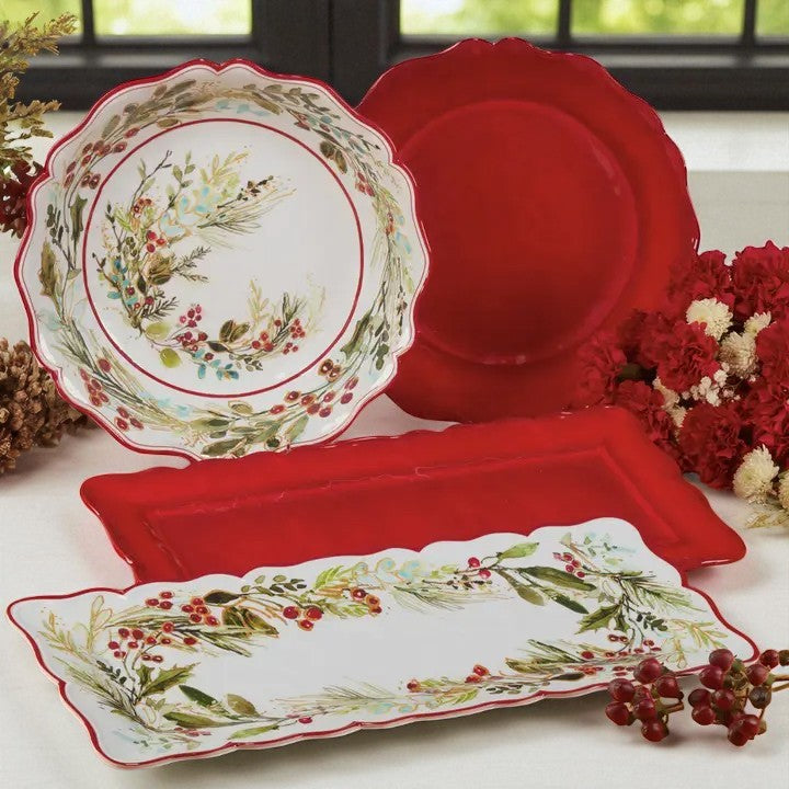 Decorative plates with floral patterns and red accents on a white surface.