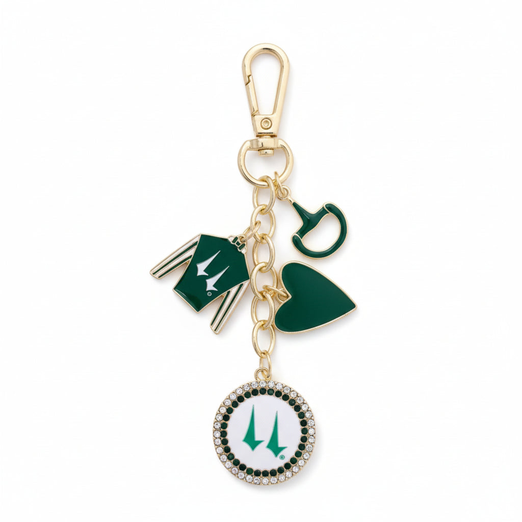 Full view of the Churchill Downs Jockey Silk Cluster Bag Charm, showcasing the green and white enamel silk charm with its layered gold-tone and bead accents.