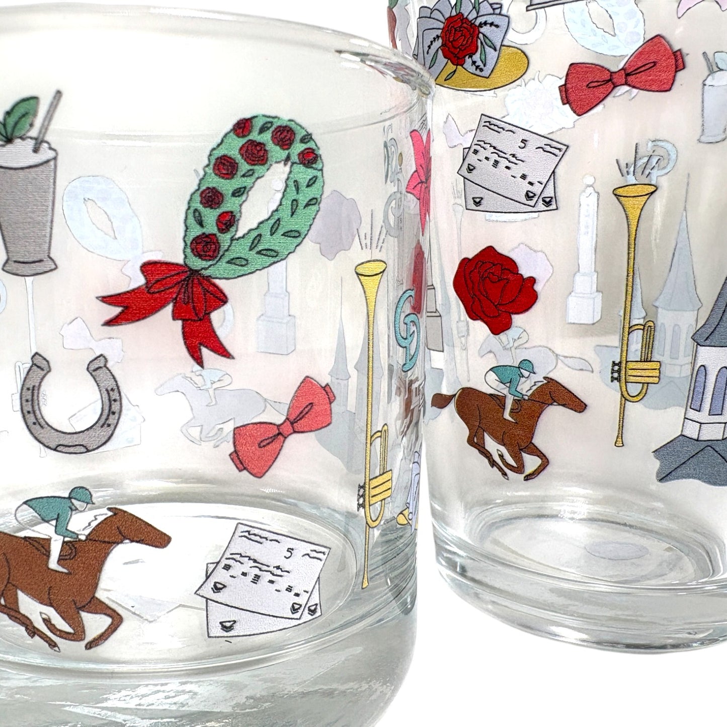 A detailed close-up showcasing the colorful jockey and horse designs on the glass.