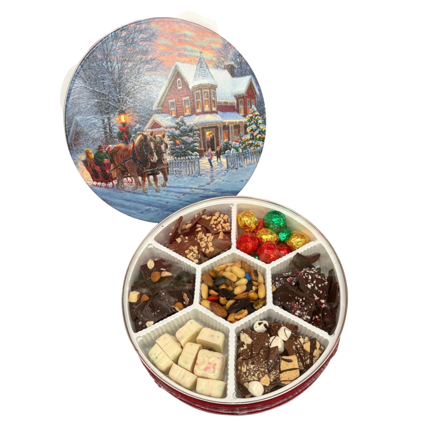 A shot highlighting the beautiful, classic holiday artwork on the lids of the tins.
