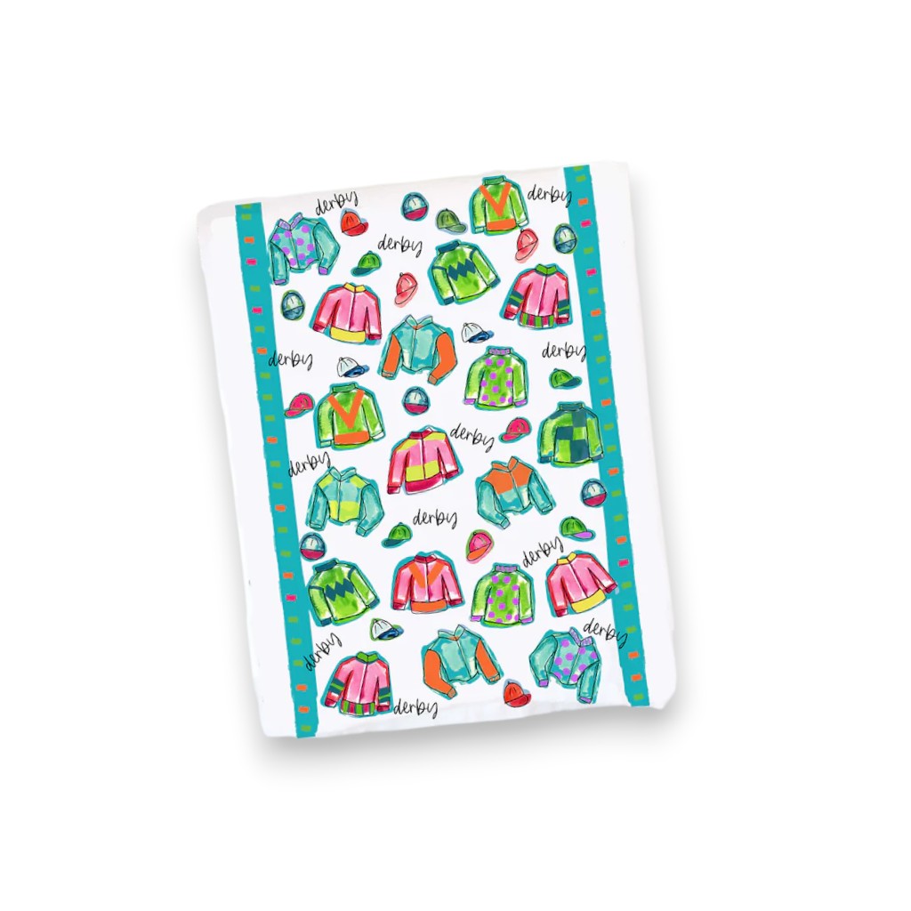 A white cotton tea towel decorated with colorful, vibrant illustrations celebrating the Kentucky Derby.