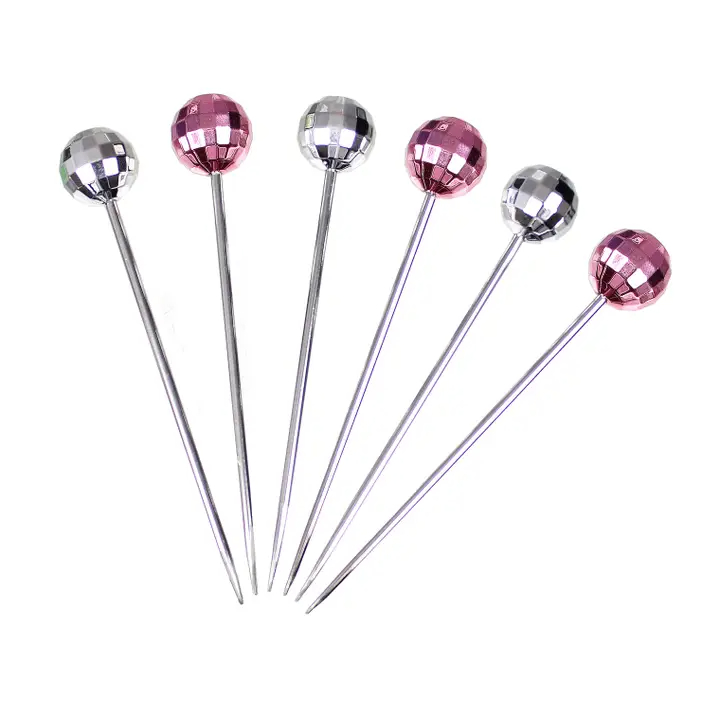 Full set of six disco ball cocktail picks, showing three pink and three silver.
