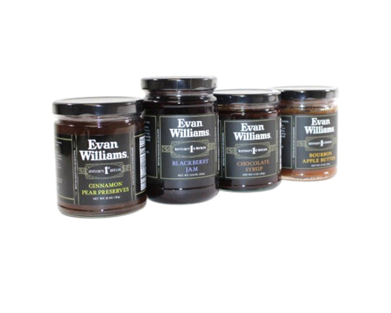 Four jars of Evan Williams jam on a white background