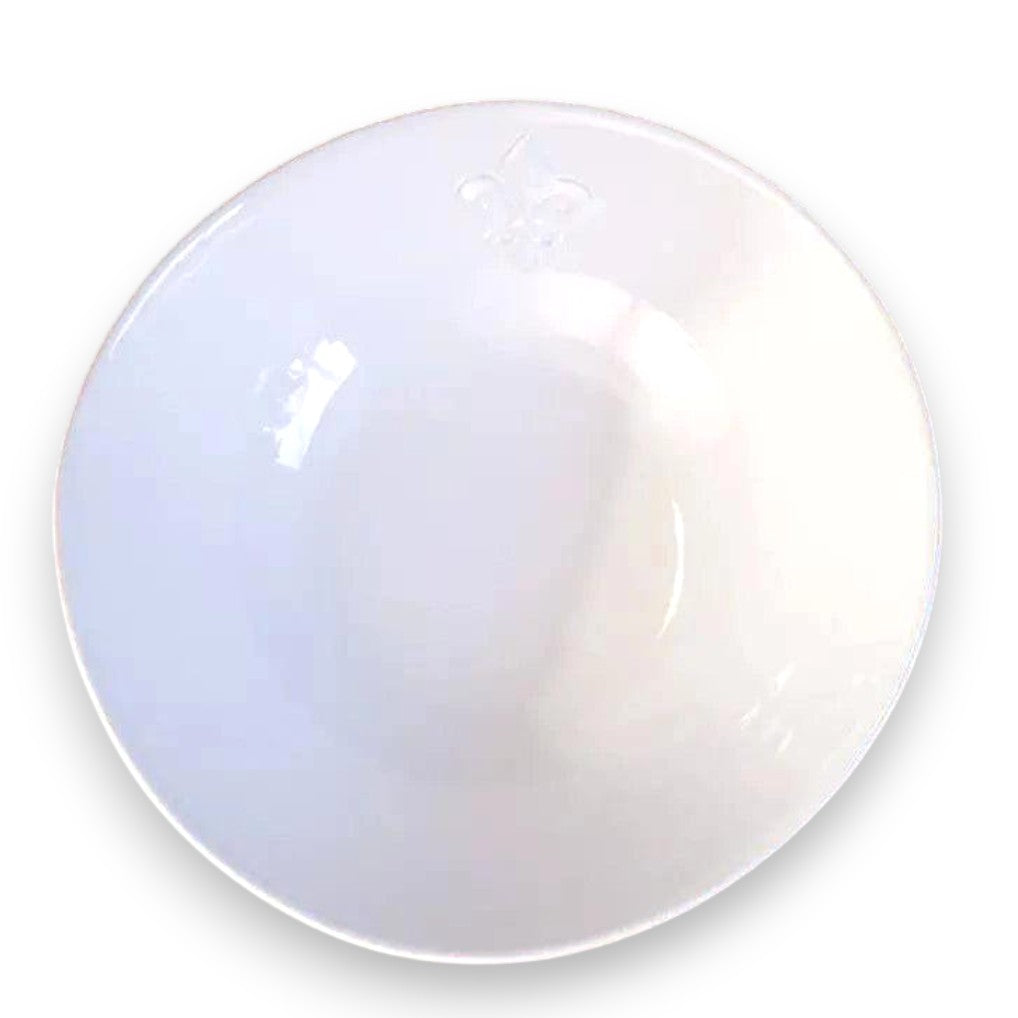 Overhead view of the white Fleur de Lis Serving Bowl, showcasing the elegant raised relief pattern around the rim.