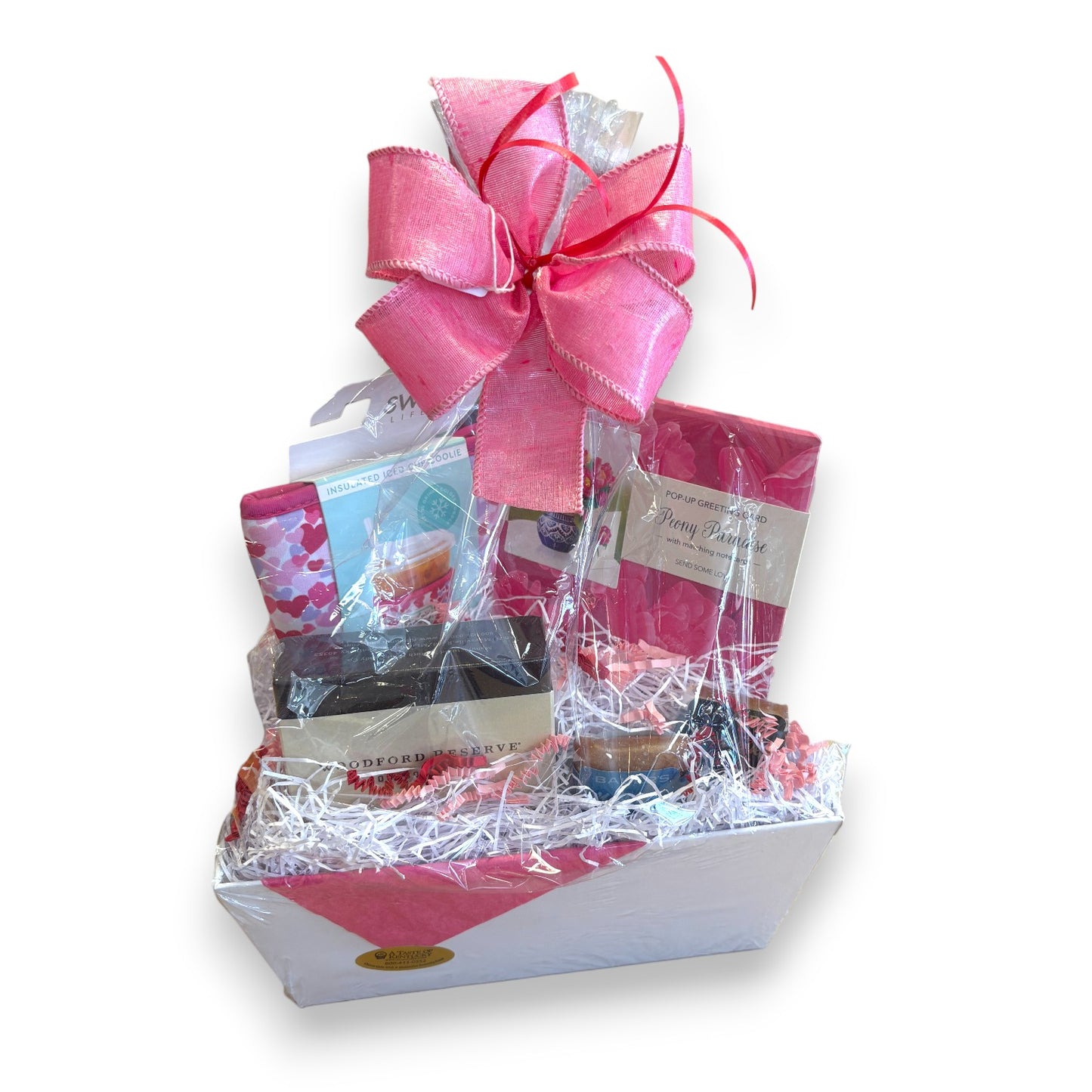 The Galentine's Gift Basket featuring a pink Swig Coolie, 3D card, and chocolates in a festive arrangement.