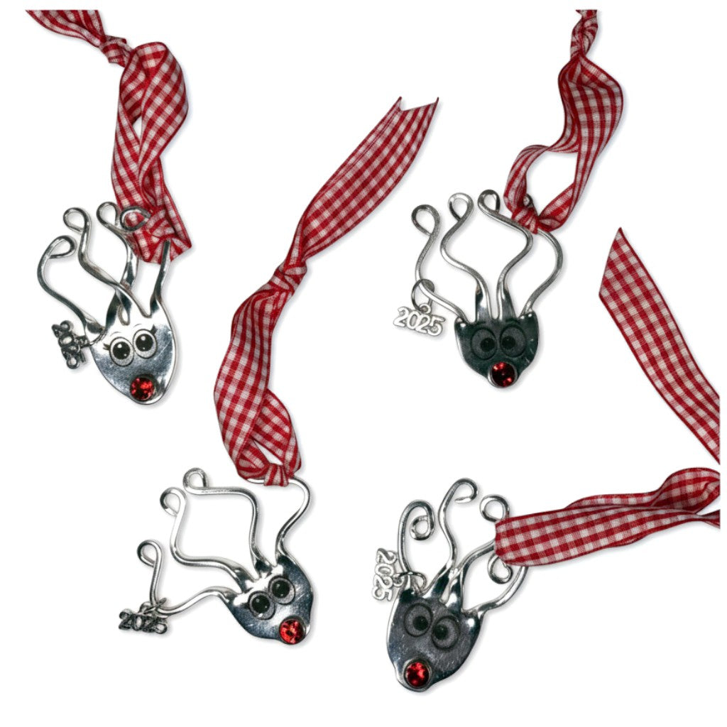 A handmade Rudolph Reindeer ornament crafted from an upcycled vintage fork.