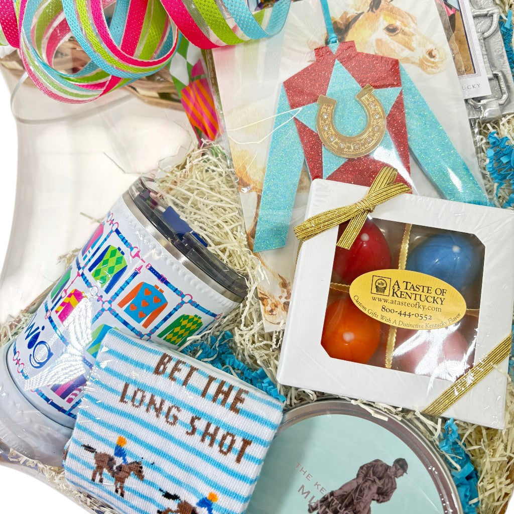 Assorted gift items including a candle, snack pack, and decorative items with horse-themed packaging.