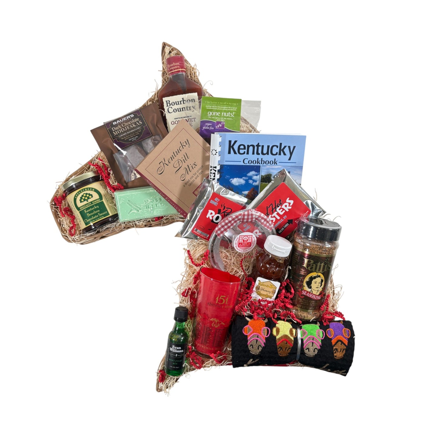 A top-down view of all the items included in the Best of the Bluegrass Basket, including a Bourbon Country Gourmet sauce, Modjeskas, and Patti's Seasoning.