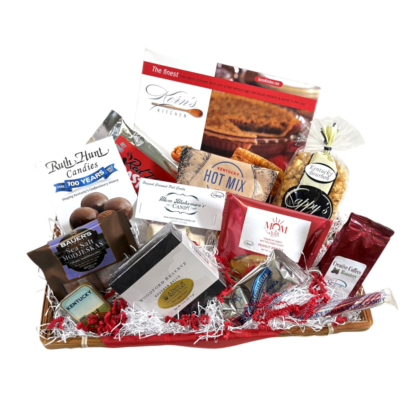 A top-down view of all the items included in the Kentucky Dessert Tray, showing the variety of candies, pies, and coffee packets.