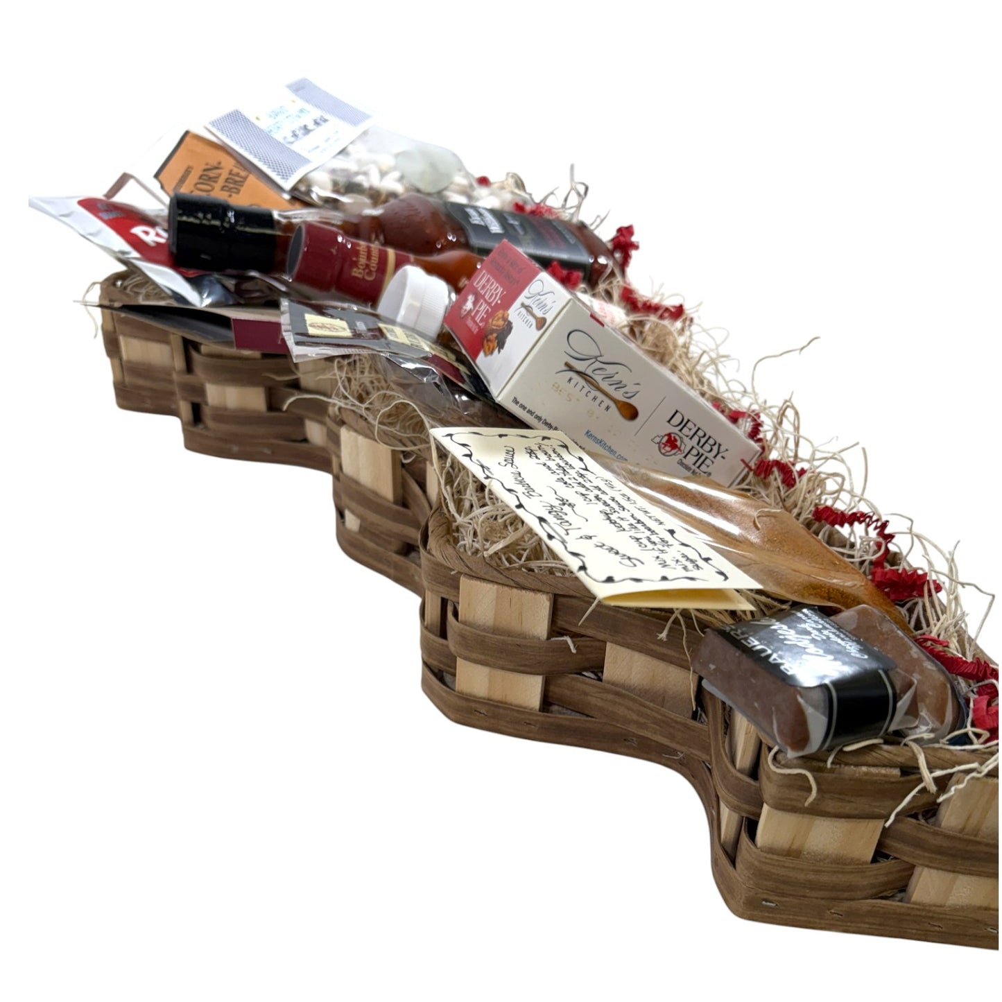 Wooden gift basket with various items including a bottle of wine and a box of chocolates on a white background.