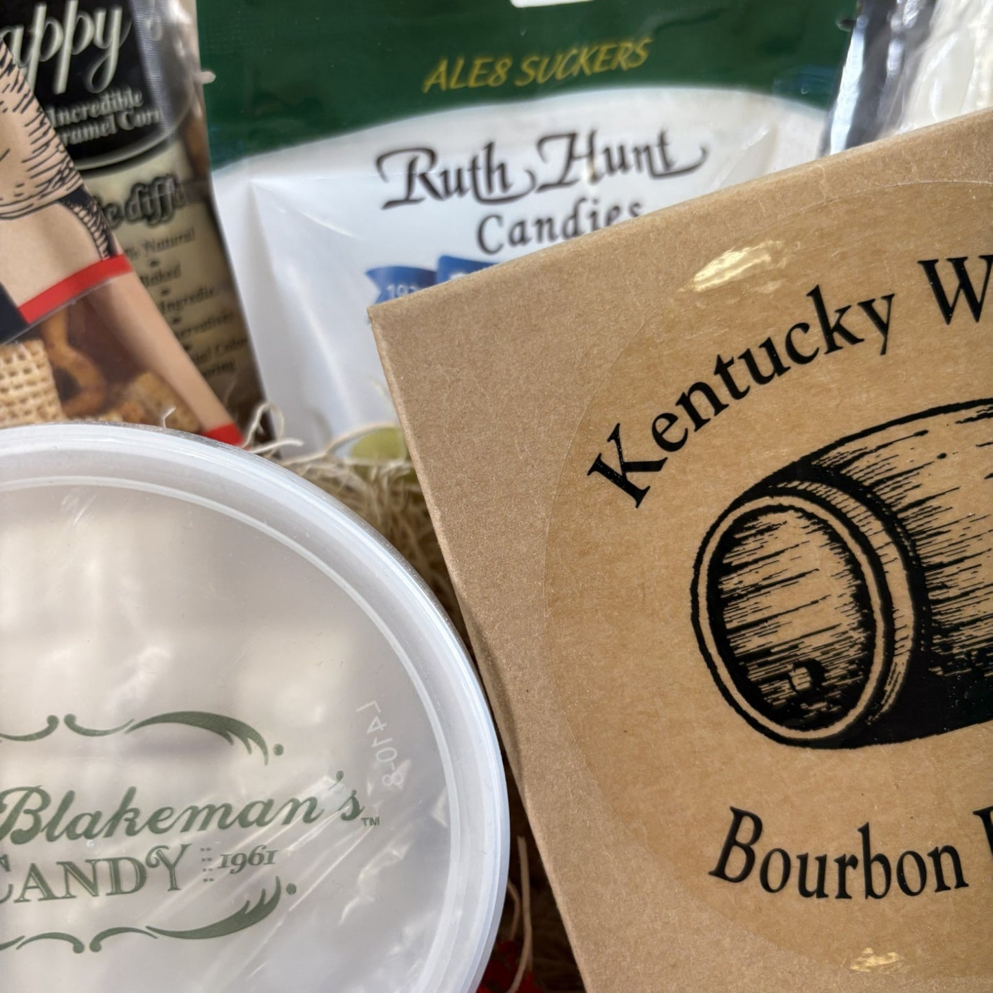A detail shot of the Kentucky Woods Bourbon Barrel Baby Cake from the Barrel of Goodness gift collection.