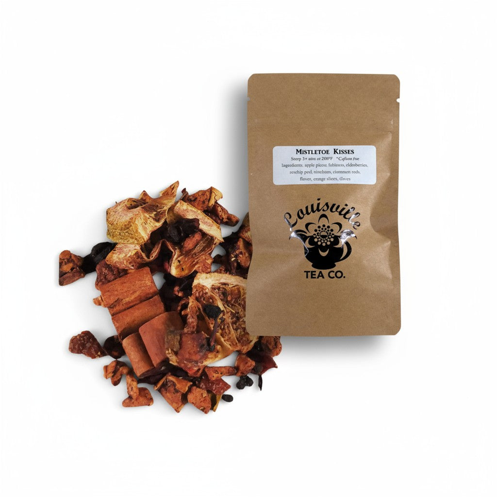 The "Mistletoe Kisses" seasonal tea blend in its festive 50g resealable pouch.