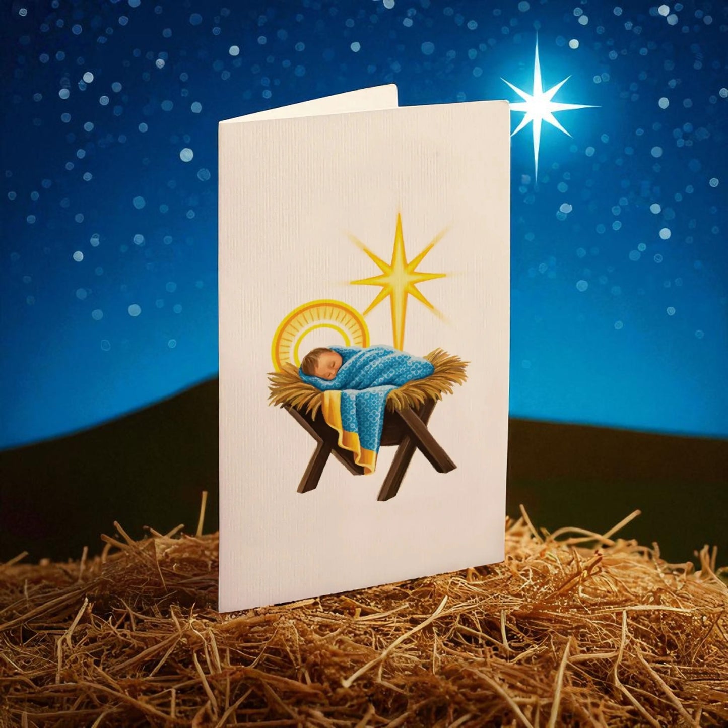 Christmas card with nativity scene illustration on a starry night background