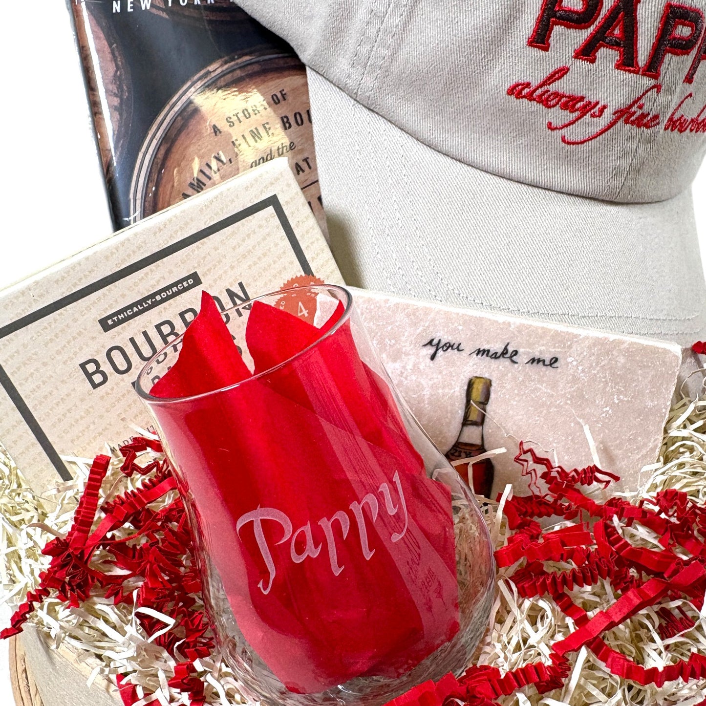 A close-up of the official Pappy Van Winkle tasting glass included in the set.