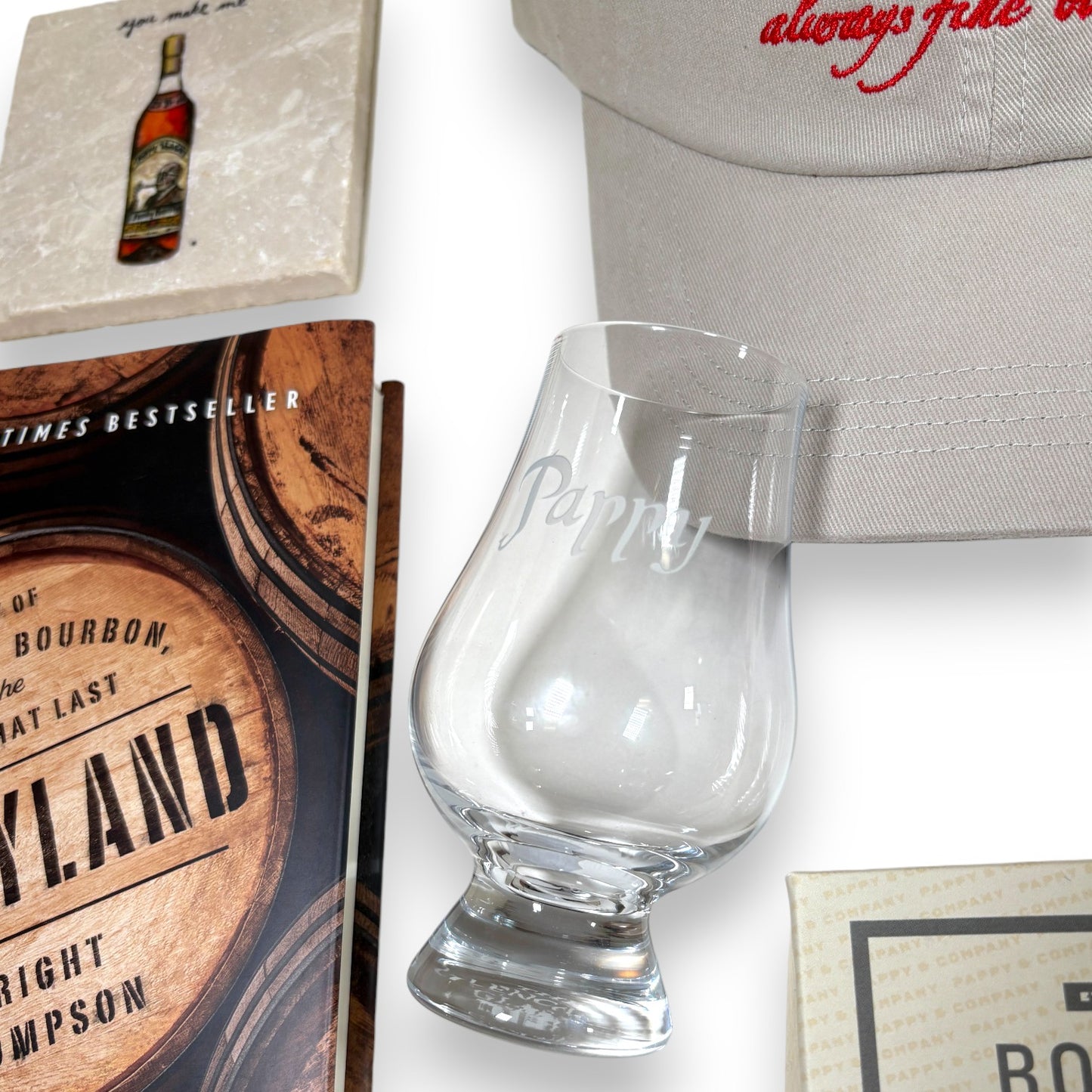 A close-up of the official Pappy Van Winkle tasting glass included in the set.