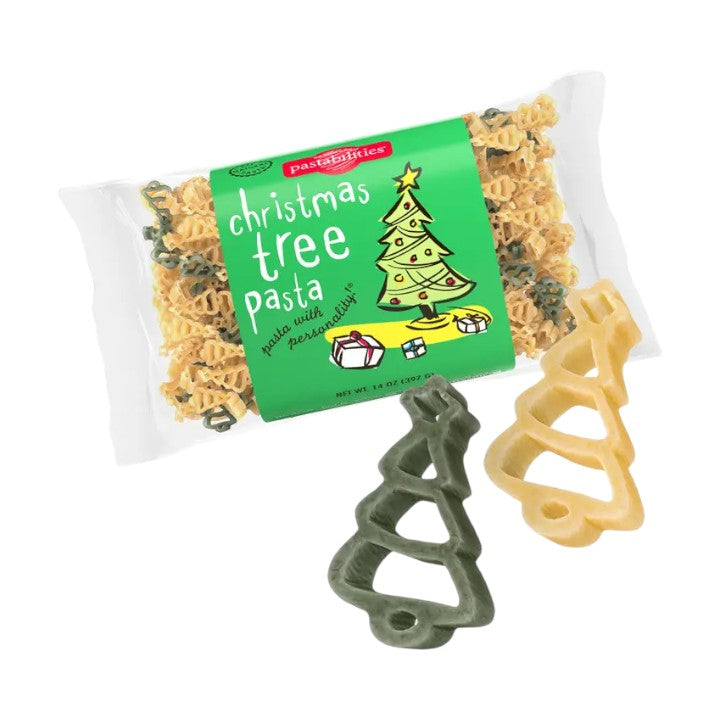 Packaged Christmas tree pasta with two tree-shaped pasta pieces on a white background