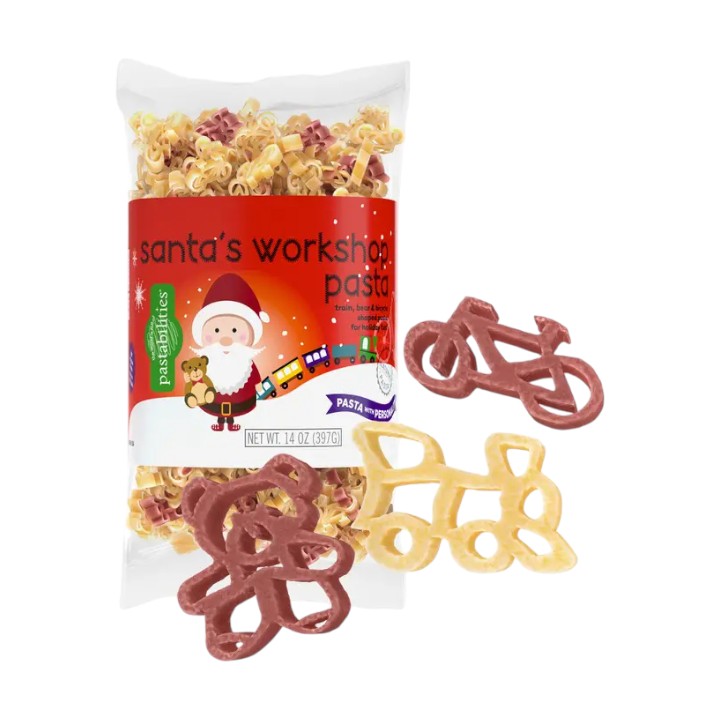 Packaged pasta with Christmas-themed design and bicycle-shaped pasta on a white background