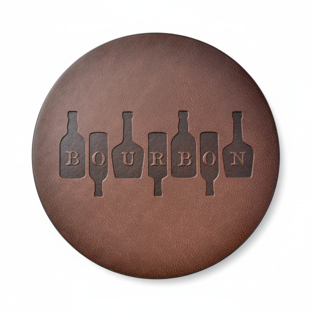 Top-down view of the round brown genuine leather coaster with dark stitching and debossed bourbon bottle graphic.