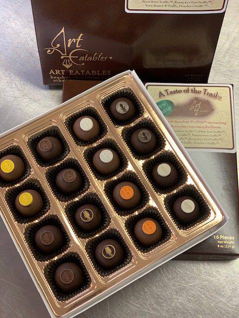 Box of chocolates with a visible brand name on the packaging.