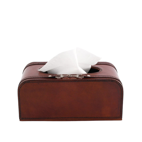 Brown leather tissue box with white tissues on a white background