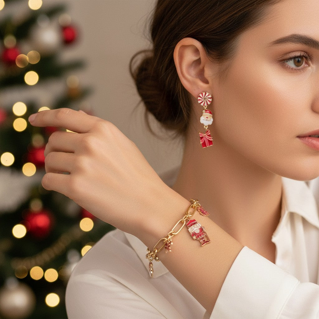 A woman smiling while wearing the festive Christmas Cheer charm necklace and drop earrings.