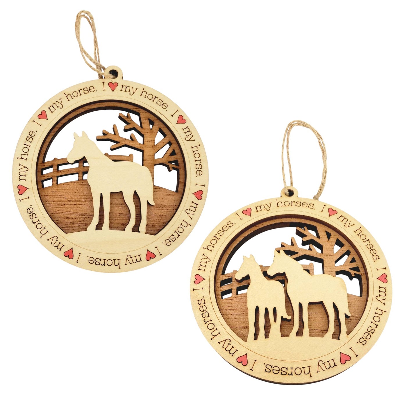 A layered wooden ornament showing a laser-cut maple foreground with the text "I Heart My Horse" over a mahogany background depicting a horse in a pasture; shown alongside a variant with two horses.