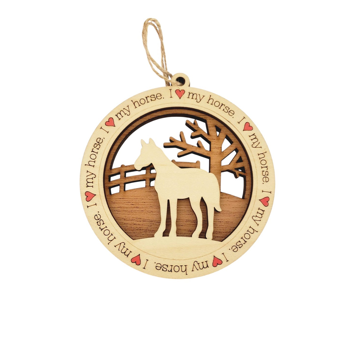 A layered wooden ornament showing a laser-cut maple foreground with the text "I Heart My Horse" over a mahogany background depicting a horse in a pasture.
