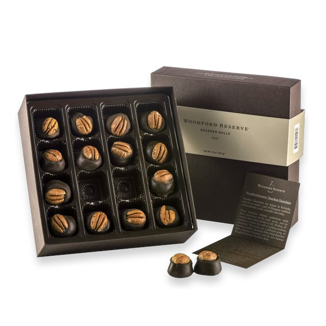 Woodford Reserve chocolate truffles in a box with a white background