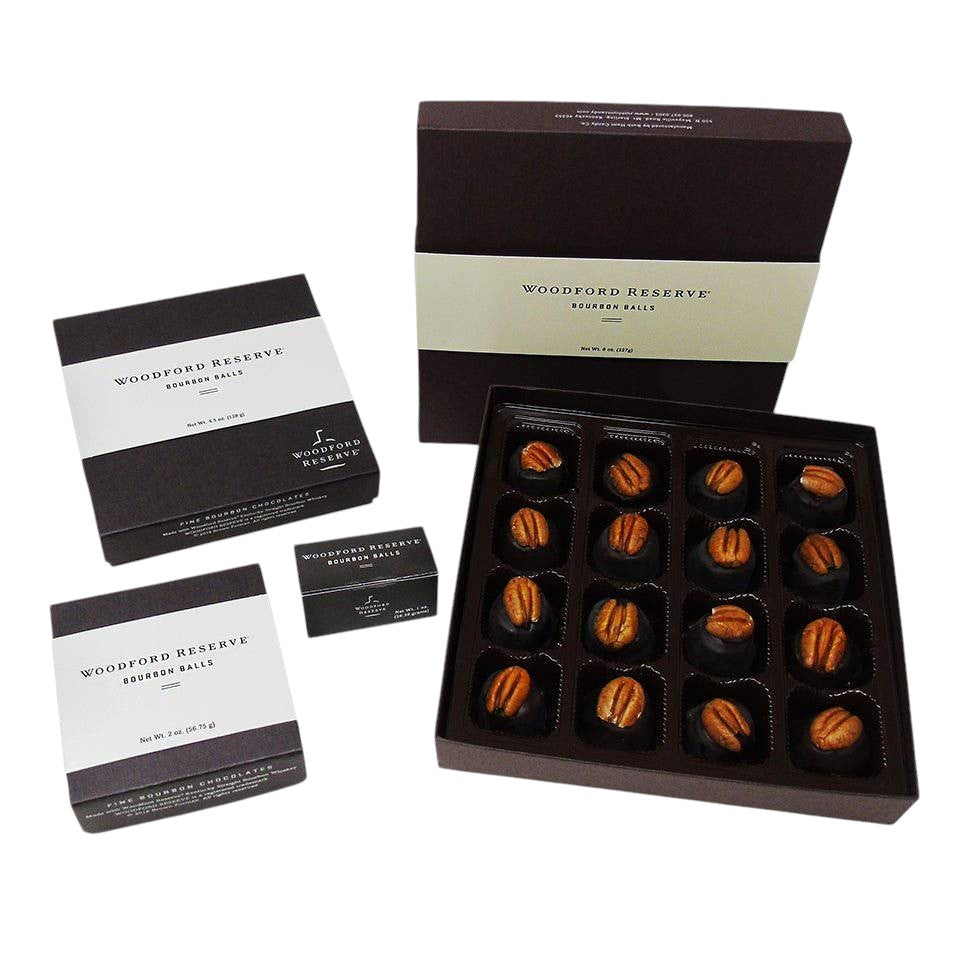 Woodford Reserve bourbon balls packaging with a box of chocolates on a white background