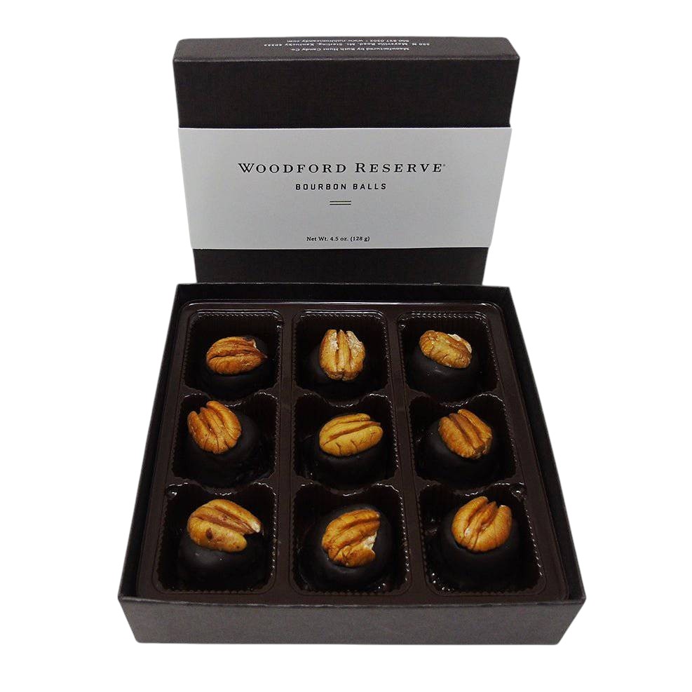Box of Woodford Reserve bourbon balls with a black and white label.