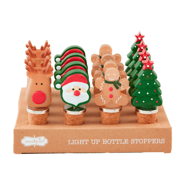 box of assorted christmas themed bottle toppers