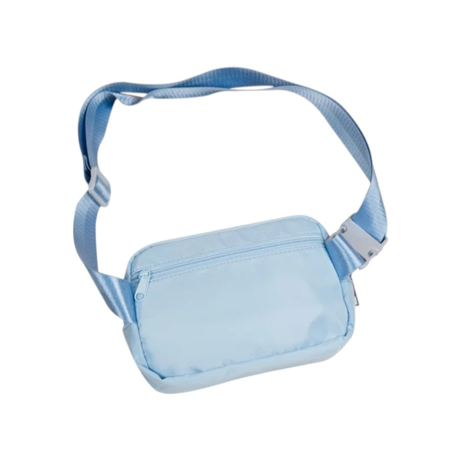 The back of the light blue polyester belt bag, showing the zippered back compartment and the adjustable strap.