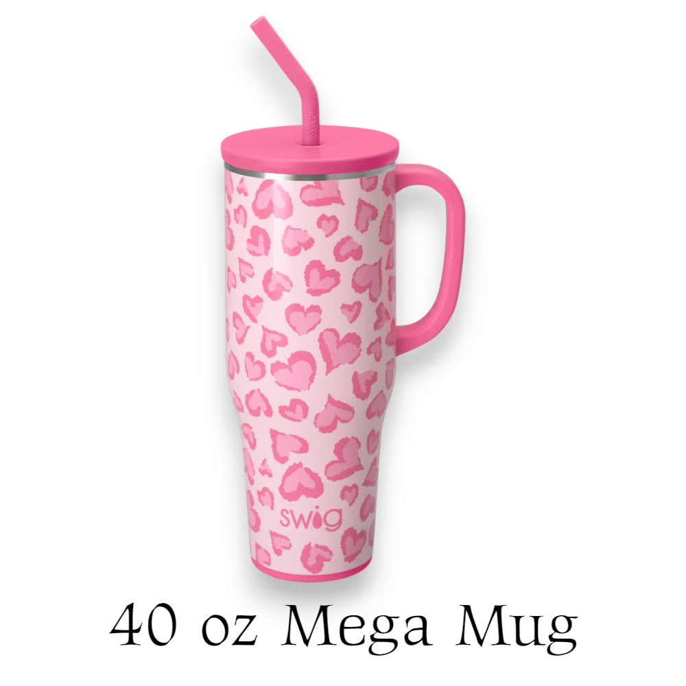 Pink 40oz Mega Mug with heart pattern and straw lid on a white background