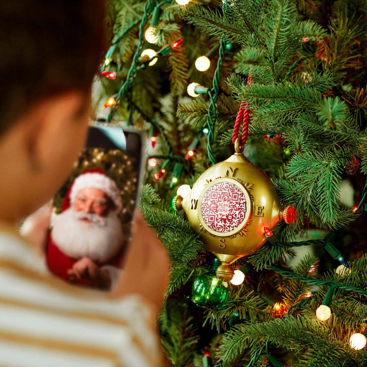 Compass and qr code ornament on a christmas tree