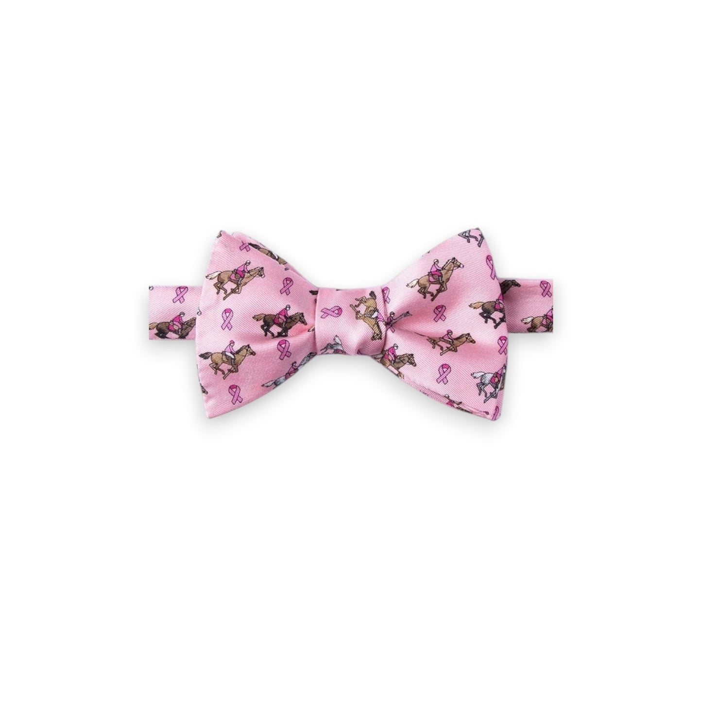 pink silk bow tie featuring a jockey and breast cancer ribbon pattern on a white background.