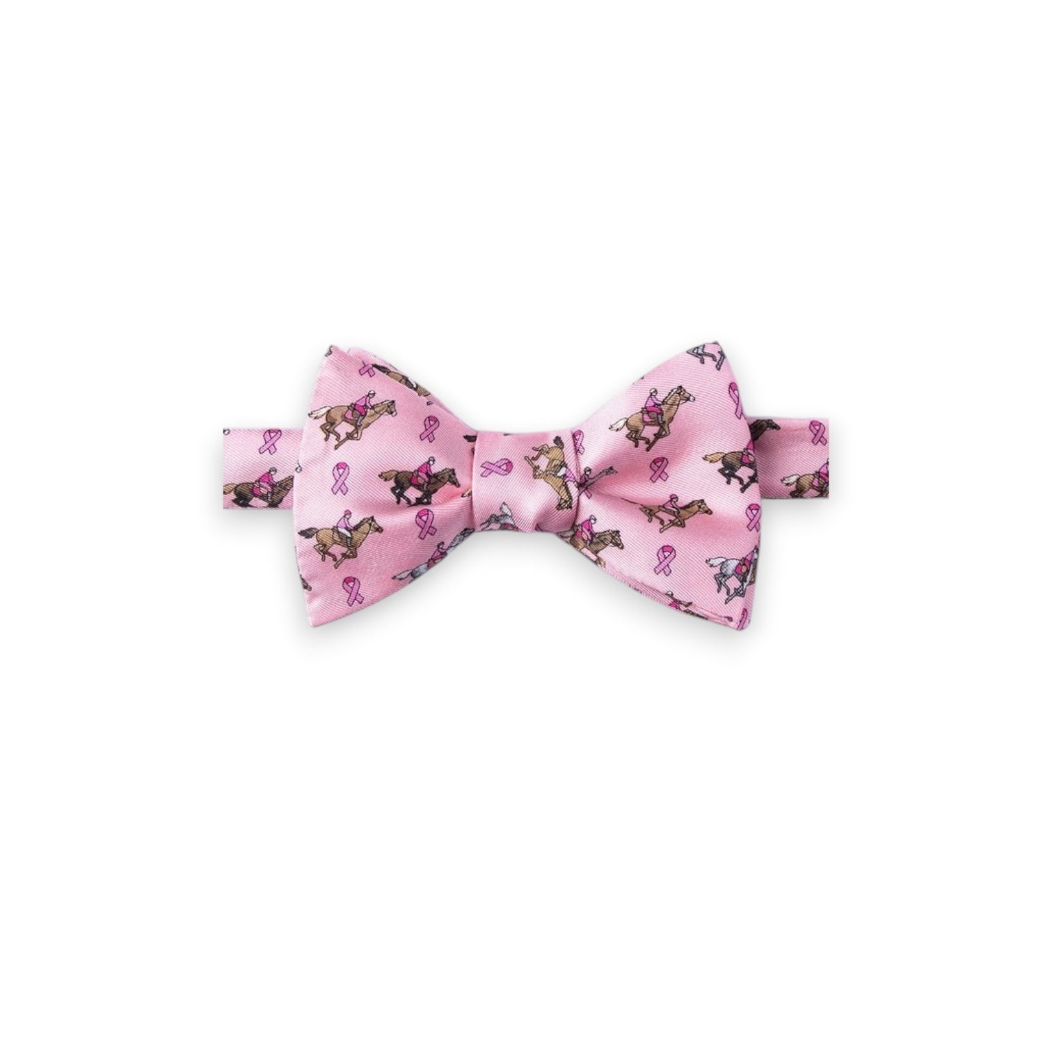 pink silk bow tie featuring a jockey and breast cancer ribbon pattern on a white background.