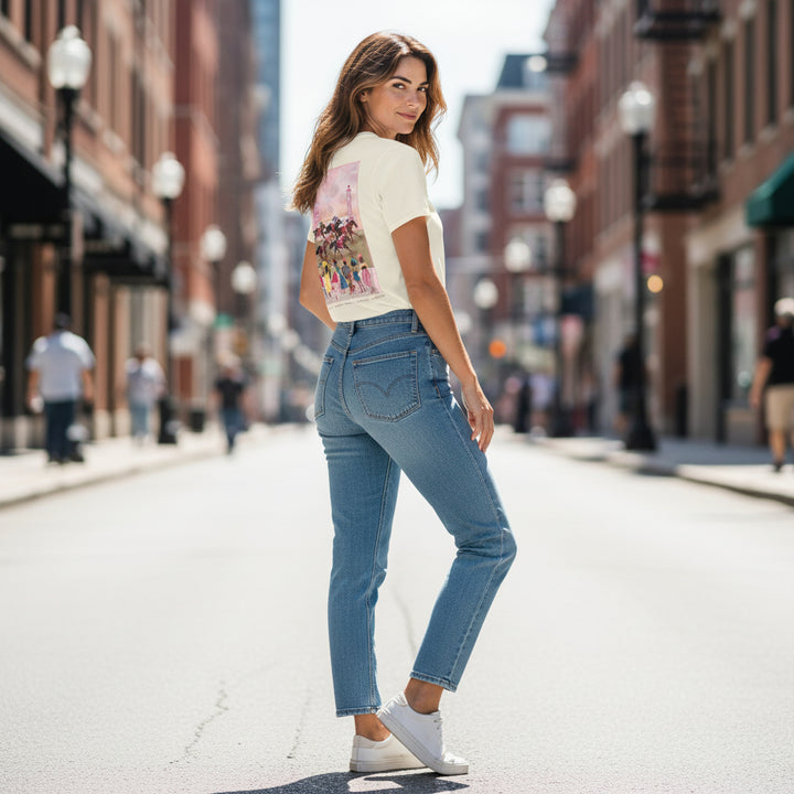 A model wearing the Art of the Derby 152 Kentucky Oaks Poster T-Shirt, showcasing the vibrant back graphic and soft natural cotton fabric.