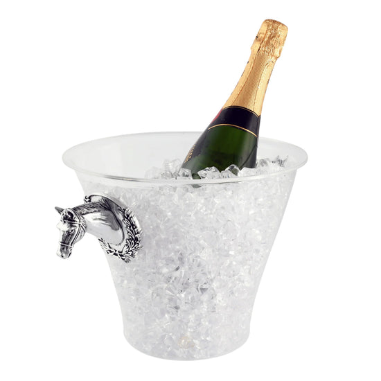 The Arthur Court horse head ice bucket filled with ice and chilling a bottle of champagne.