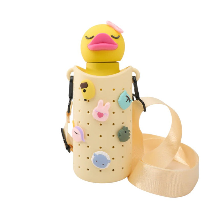 The ASOBU Bestie Sling Bottle Carrier in cheerful yellow with collectible charms on a white background.