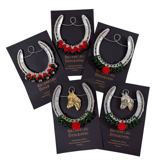 Set of bejeweled horsehoes on black cards with 'Bejeweled Horsehoes' branding.