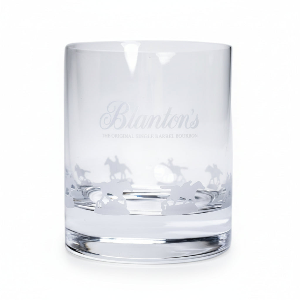 The Blanton's Glencairn Etched Gallop Glass showcasing the detailed horse and jockey design wrapping around the base.