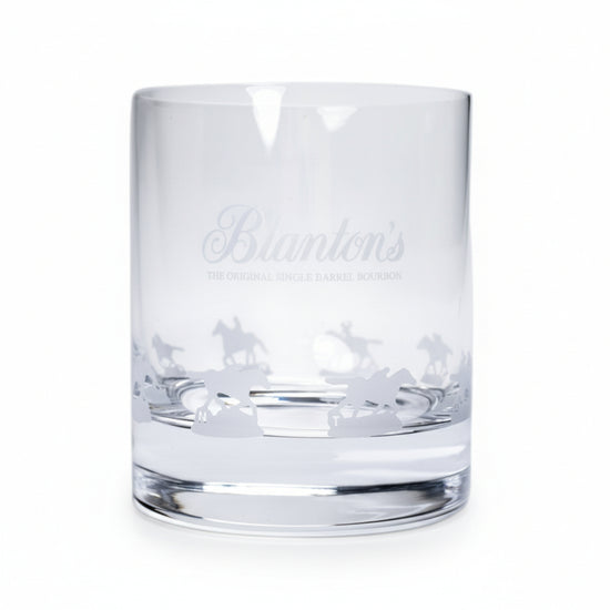 The Blanton's Glencairn Etched Gallop Glass showcasing the detailed horse and jockey design wrapping around the base.