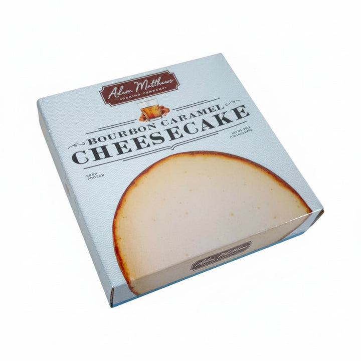 Box of Alan Matthews Bourbon Caramel Cheesecake on a white background