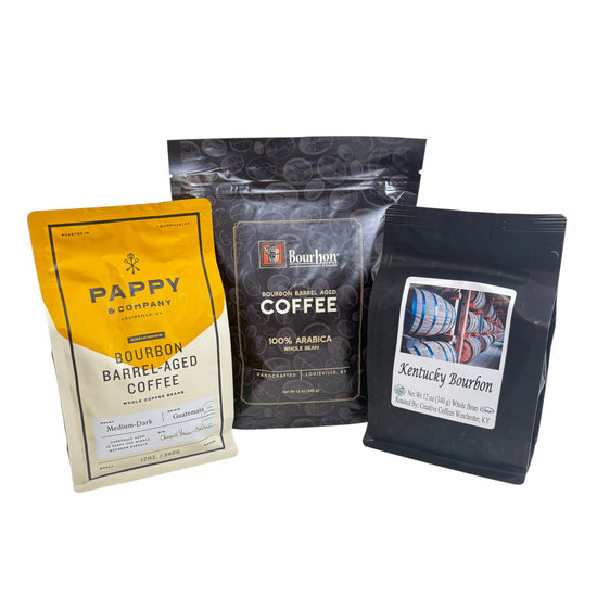 A gift set of three Kentucky bourbon barrel-aged coffees: Pappy & Co, Bourbon Barrel Foods, and Kentucky Bourbon.